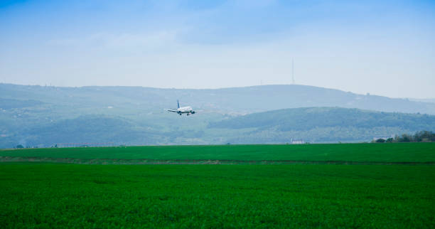 istock airplane landing on airport runway 1138429102