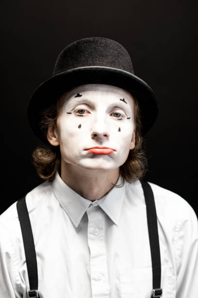 黒の背景にパントマイム - clown mime sadness depression ストックフォトと画像