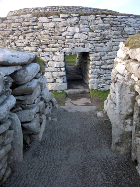 Entrance Clickimin Broch, Lerwick, Shetland Islands, Scotland The Broch of Clickimin (also Clickimin Broch) is a large, well-preserved but restored broch in Lerwick in Shetland, Scotland. Originally built on an island in Clickimin Loch, it was approached by a stone causeway. The broch is situated within a walled enclosure and, unusually for brochs, features a large "forework" or "blockhouse" between the opening in the enclosure and the broch itself. broch of clickimin stock pictures, royalty-free photos & images