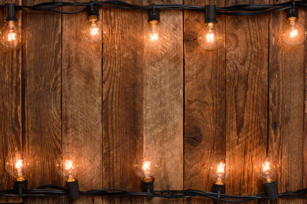 istock Vintage garland on old rustic wooden wall 1138435257