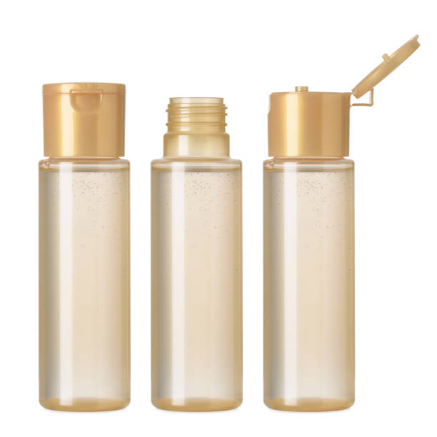 Mineral oil toner moisturizer cosmetics bottle open closed isolated stock photo