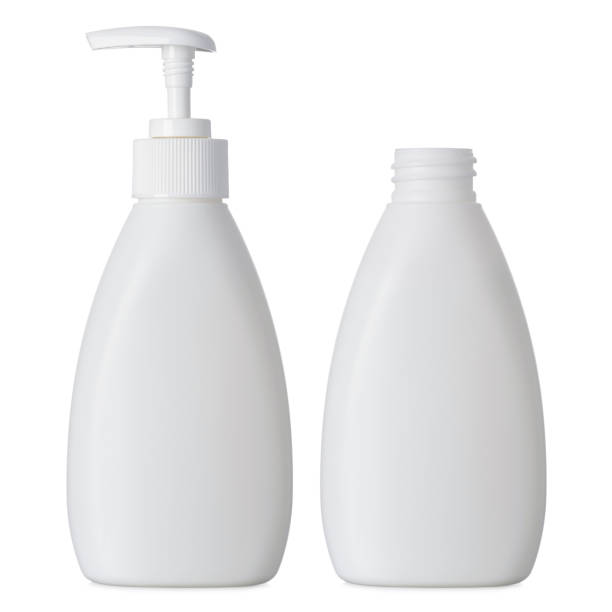Cosmetic liquid bottle with and without pump dispenser stock photo