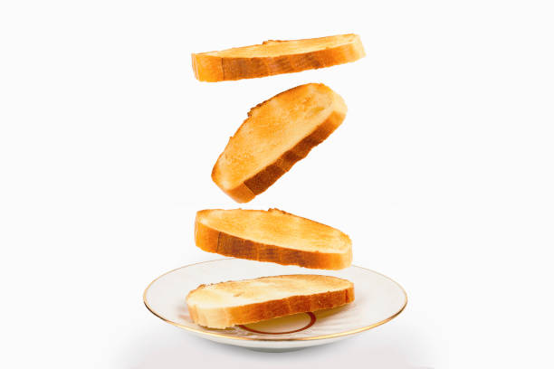 istock Toasts are falling on a saucer close-up on white background 1138438156