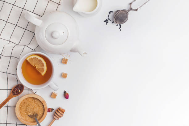 istock Creative composition witn variety of tea, sugar, lemon and other accessories for making tea 1138438588