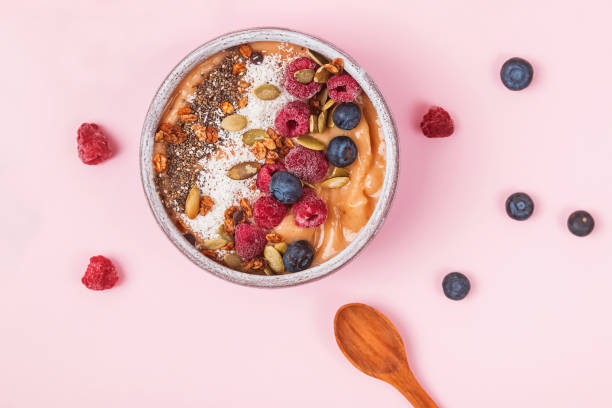 istock Delicious smoothie bowl with berries and dryed coconut. 1138438623