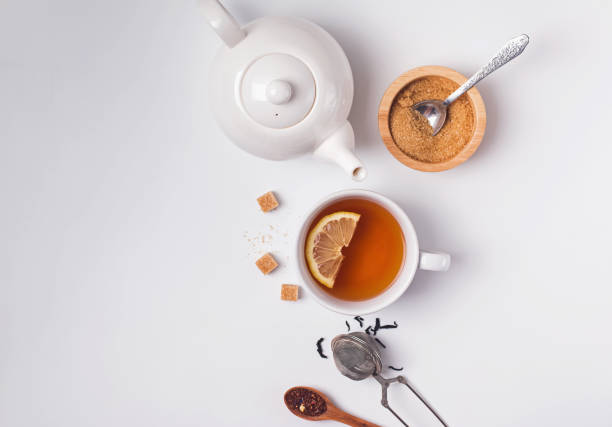 istock Cup, teapot and sugar on the white background, top view 1138438629