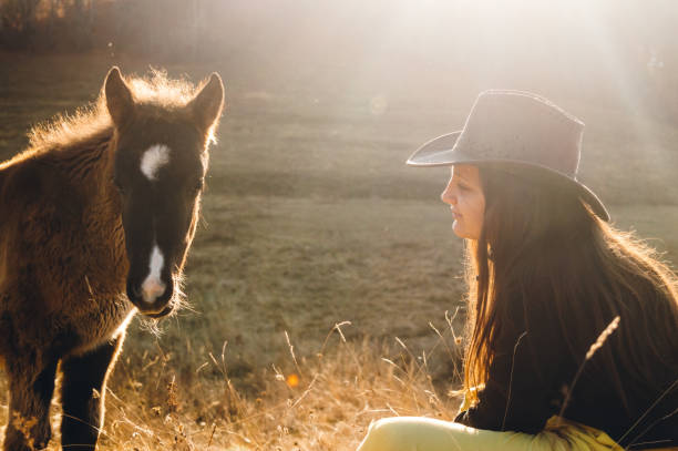 istock Young woman and her pony friend 1138438771