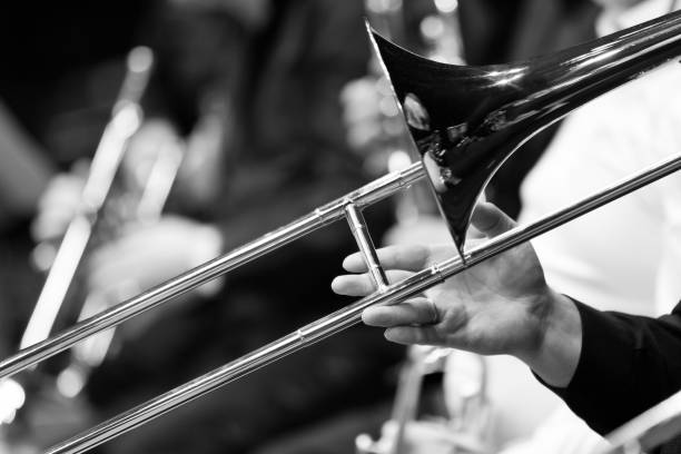 istock Hand of man playing the trombone 1138439502