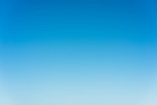 Graduated blue summer sky - genuine photograph A photo of clear blue sky, just above the horizon, giving a subtle color graduation. light blue stock pictures, royalty-free photos & images