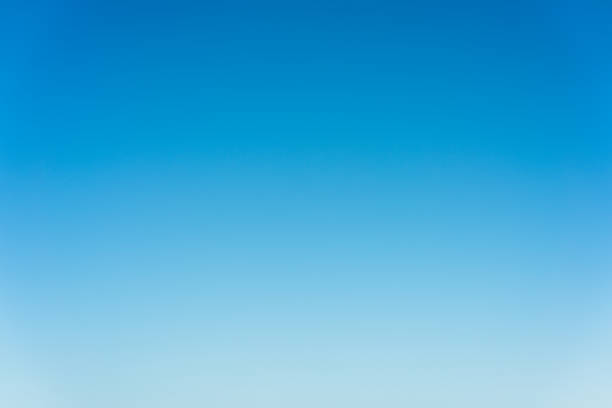 Graduated blue summer sky - genuine photograph A photo of clear blue sky, just above the horizon, giving a subtle color graduation. blue stock pictures, royalty-free photos & images