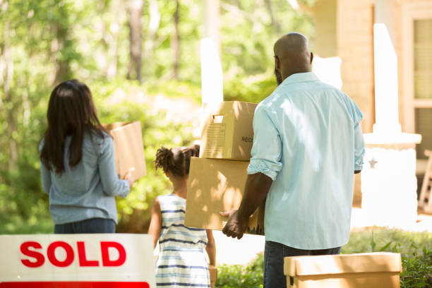 istock Family moving into new home. 1138442956