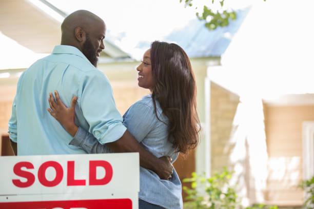 istock Couple moving into new home. 1138443001