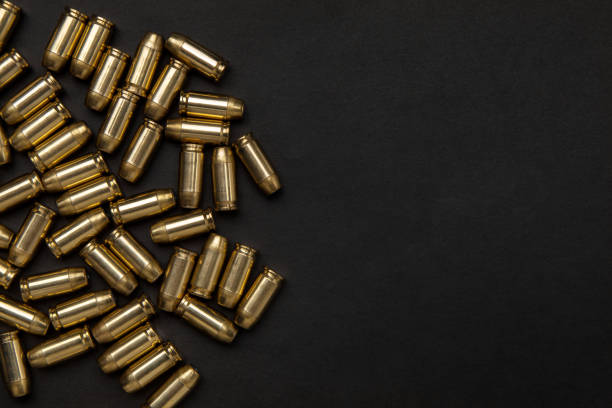istock Rifle cartridges on a black background 1138443041