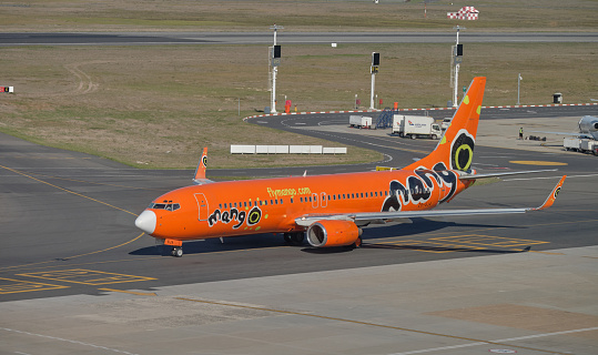 Mango airlines plane taxi on runway. View of full plan and logo at airport in Cape Town , South Africa March 21, 2019