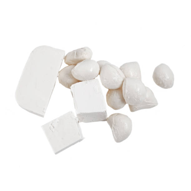 istock White cheese isolated on the white background 1138447147