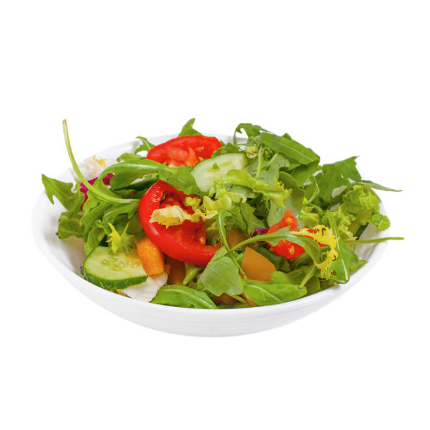 istock Fresh vegetable salad  in plate, isolated 1138447332