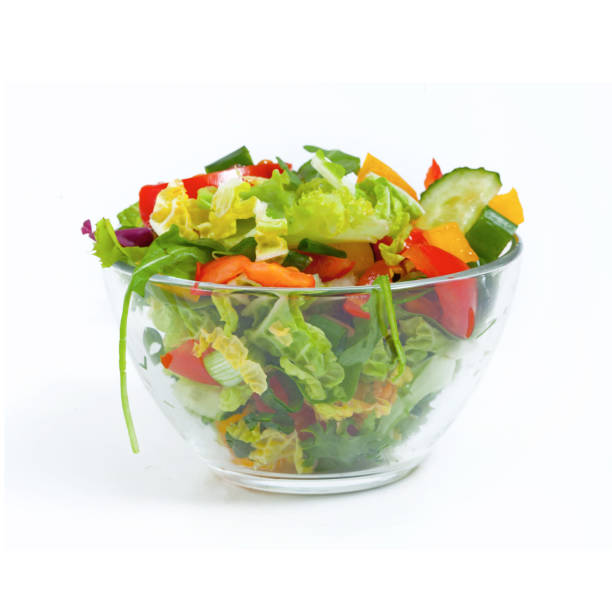 istock Fresh vegetable salad  in plate, isolated 1138447414