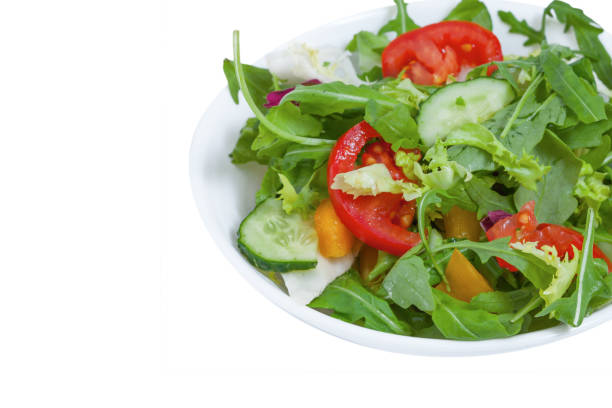 istock Fresh vegetable salad  in plate, isolated 1138448132