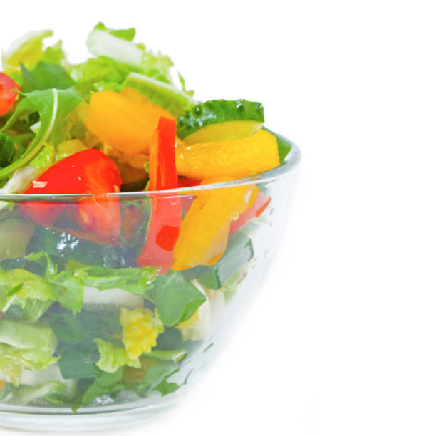 istock Fresh vegetable salad  in plate, isolated 1138448162