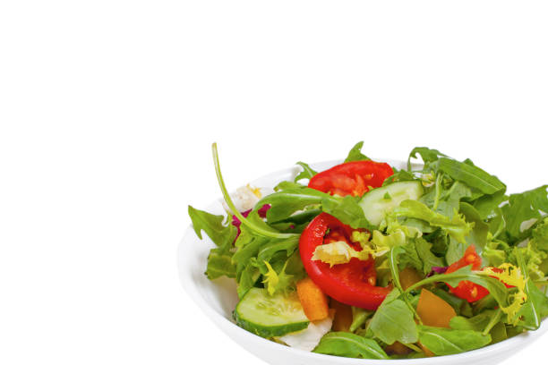 istock Fresh healthy vegetable salad isolated on the white background 1138449067