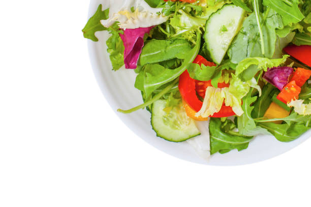 istock Fresh healthy vegetable salad isolated on the white background 1138449590
