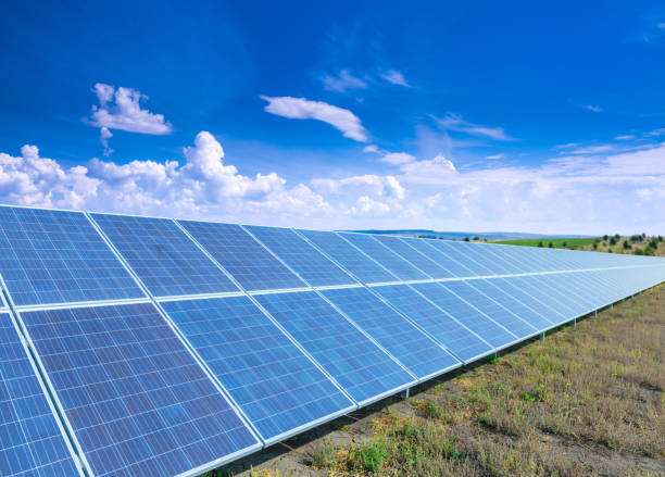 istock Solar panels, photovoltaic, alternative source environmentally friendly energy. In the backlight sunbeam light. 1138451443