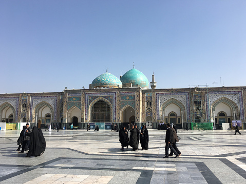 The big square of  the  Holy Shrine of Imam Reza with pilgrims in front of the mosque Mashad is the second biggest town in Iran.