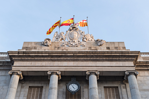 Flags on the facade of the Barcelona City Council (Spain)