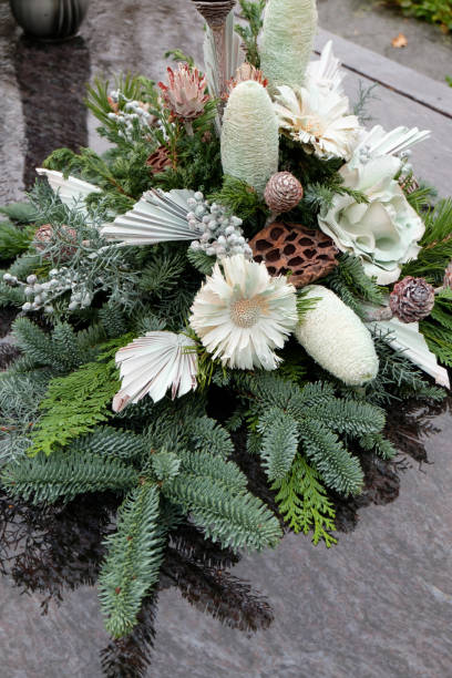 istock Floral arrangement on a grave at all saints day 1138454694