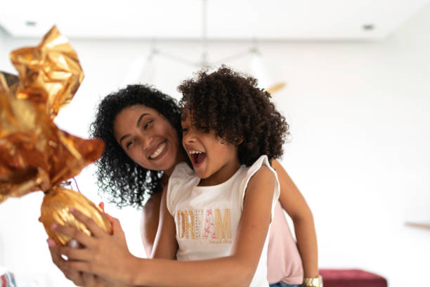 istock Latin mother and daughter celebrating easter at home 1138460009