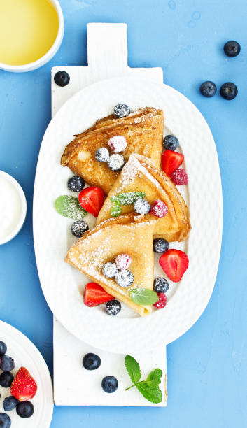 istock Pancakes with fresh berries and honey. 1138461463