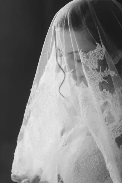 istock Beautiful bride portrait with veil over face 1138463497