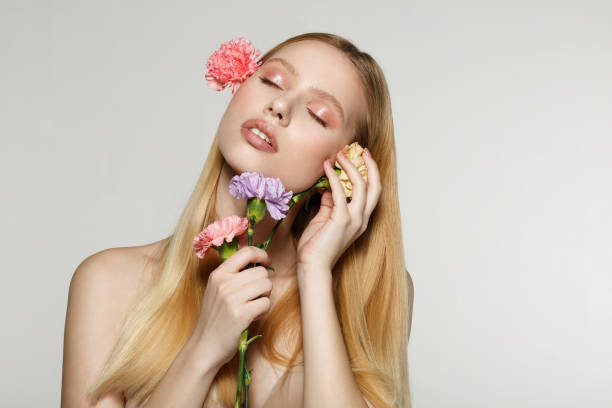 istock Beautiful young woman with eyes closed, perfect skin 1138464458