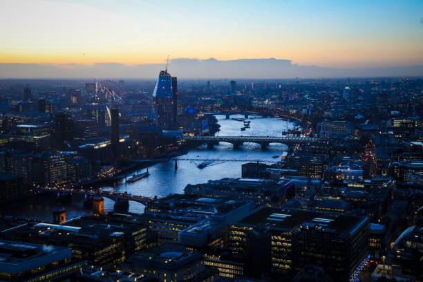 London cityscape financial district skyscrapers sunset