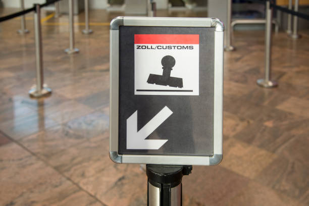 Bilingual customs  control sign at international airport