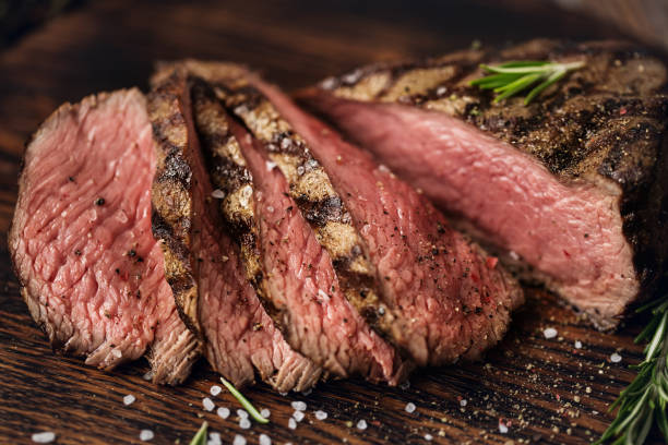 grilled beef steaks with spices. - meat steak filet mignon sirloin steak imagens e fotografias de stock