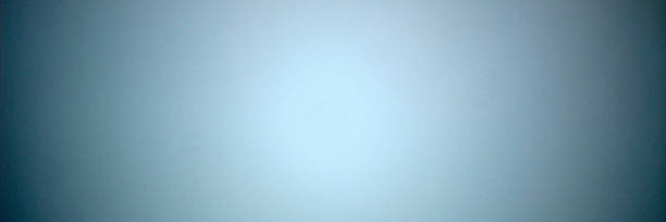 istock light blue background with darkening around the edges. 1138471348