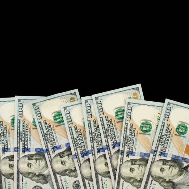 istock American Dollars 100 banknote bill border on black chalkboard background 1138471561