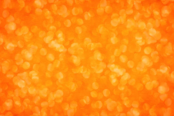 Abstract orange color glitter sparkle background for fall Halloween border, Autumn Thanksgiving sale or Christmas party invitation
