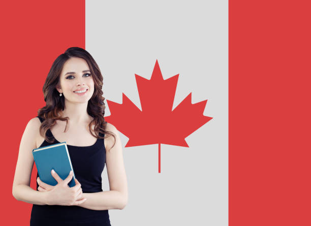 Canada concept. Young woman student with the Canada flag. Live, work, education and internship in Canada Canada concept. Young woman student with the Canada flag. Live, work, education and internship in Canada expatriate photos stock pictures, royalty-free photos & images