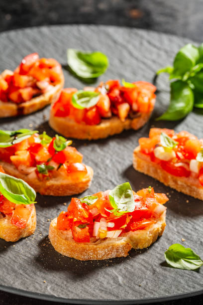 istock Classic italian bruschetta served on table 1138474241