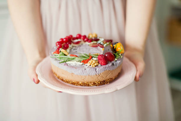 istock raw vegan cake with fruits and seeds 1138475952