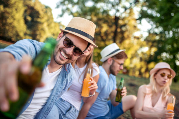 istock Cheerful group of friends having fun in park 1138479913