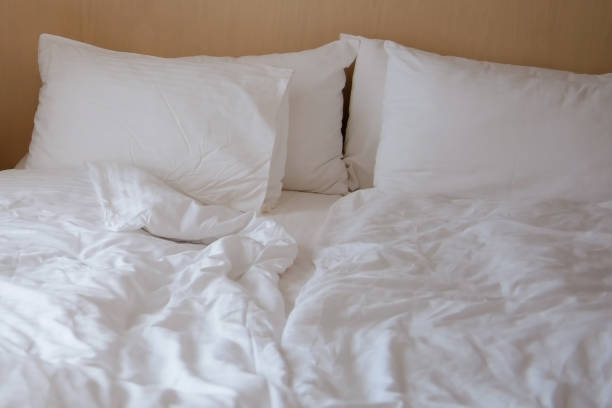 istock Crumpled bed linen in the morning. 1138480072