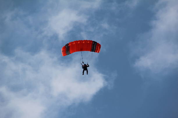 istock The paratrooper descends to the ground 1138482800