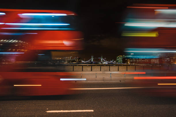Long Exposure London Tower Bridge and bus in motion in between the bridge