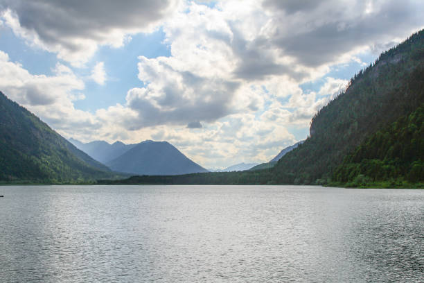 istock cloudy view over the lake to the mountains 1138485037