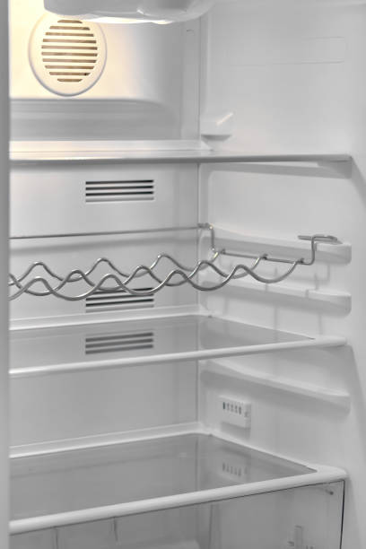 istock Open door of modern refrigerator 1138485064