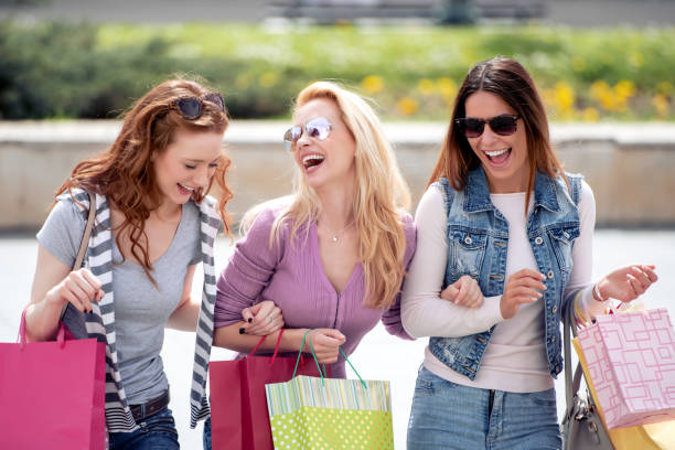 istock Happy friends in shopping 1138485299