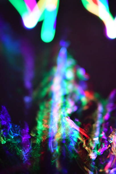 istock Multi Colored Laser Beam and Smoke with W Shape 1138486386